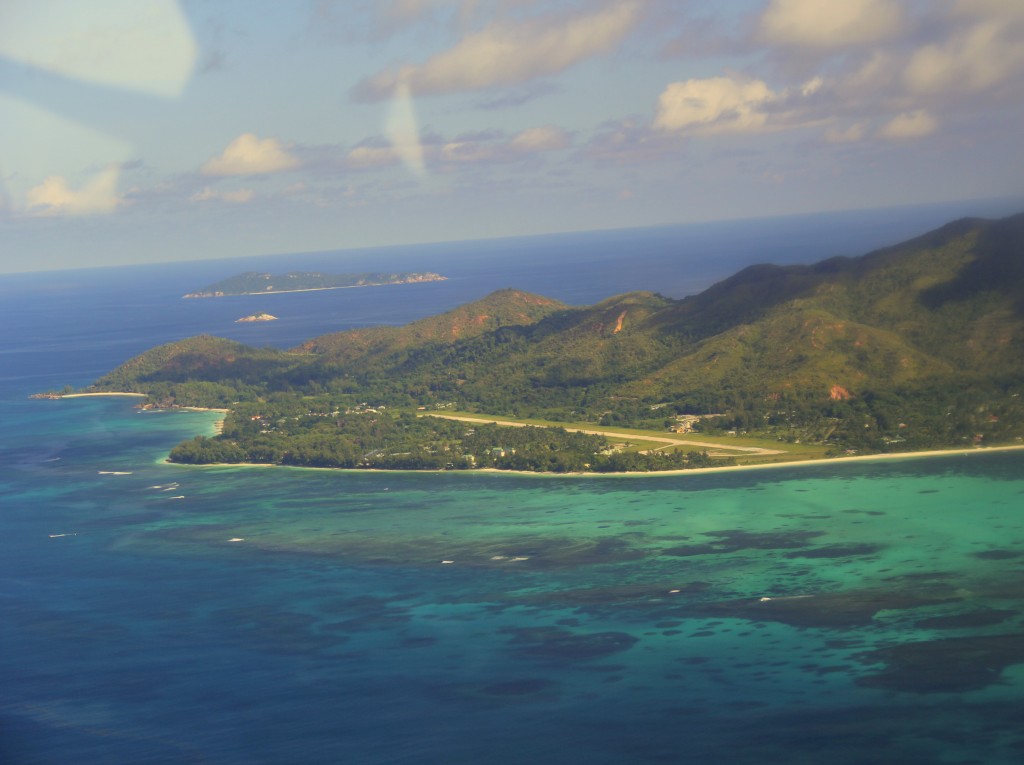 View of Praslin airport runway from plane